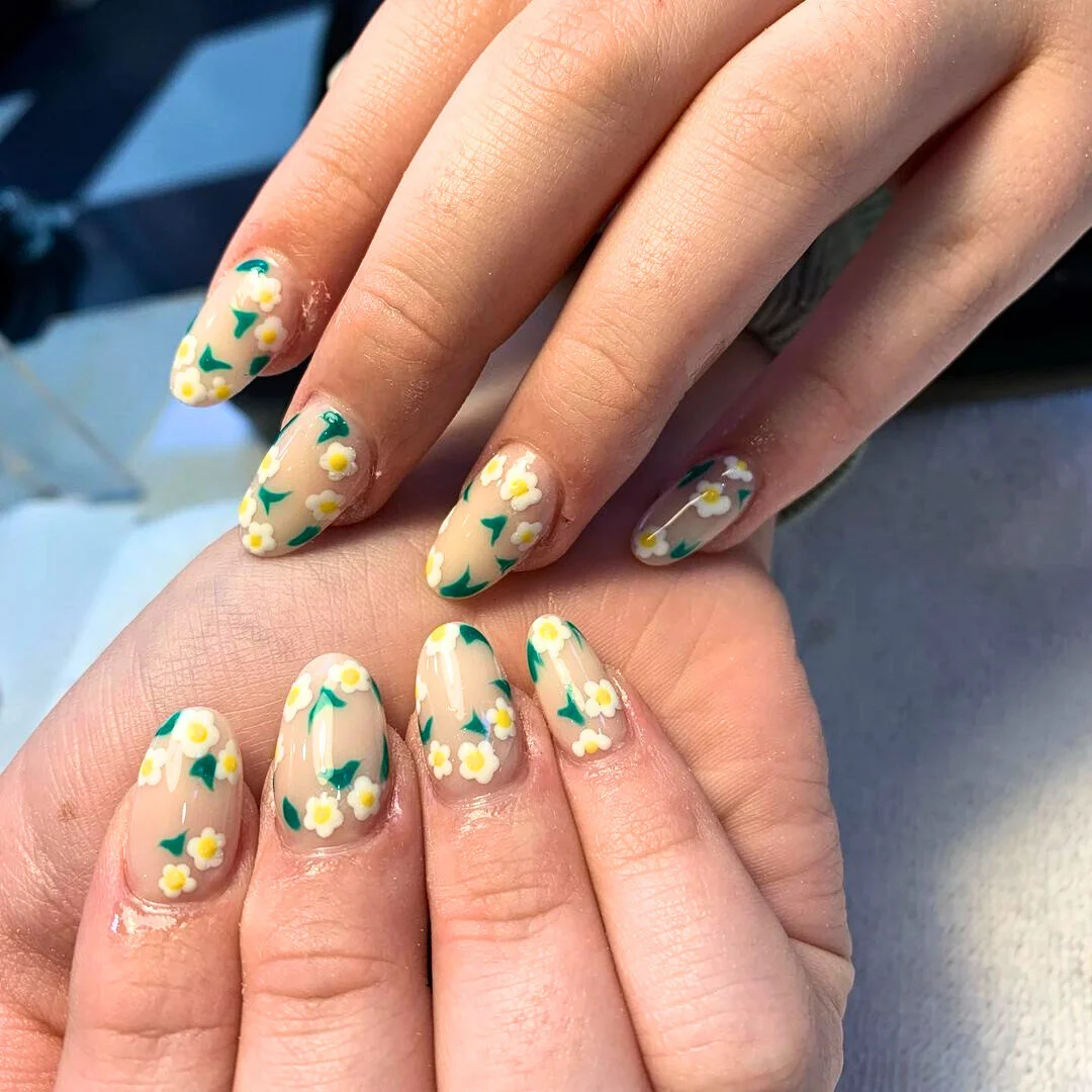 summer vibrant nails summer 2026 Soft Daisy Nails With a Sheer Garden Finish
