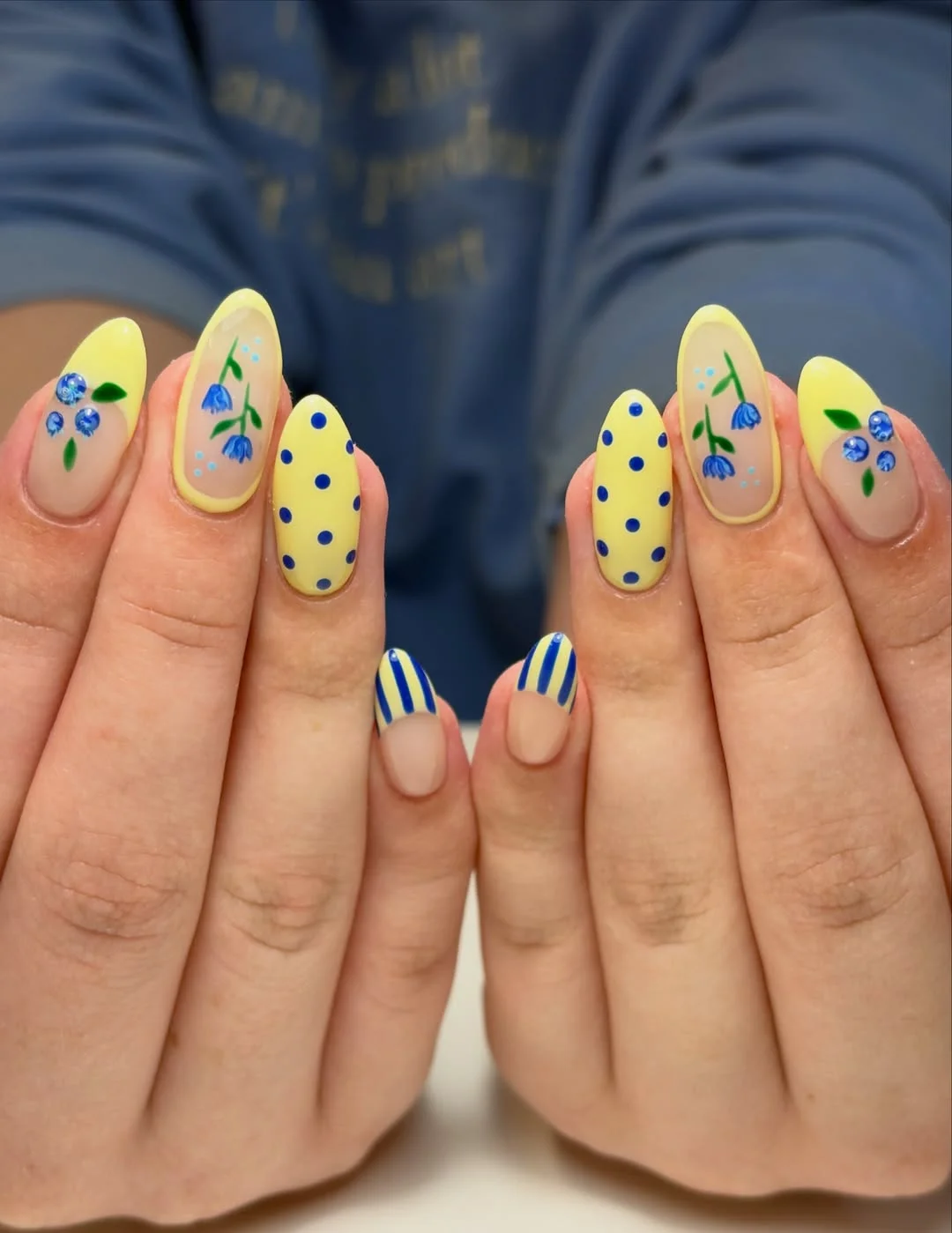 summer yellow nails 2026 Blue and Yellow Floral Nails With Playful Dots