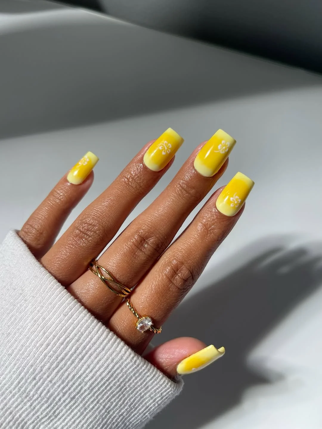 summer yellow nails 2026 Glossy Neon Yellow Square Nails With White Flower Details