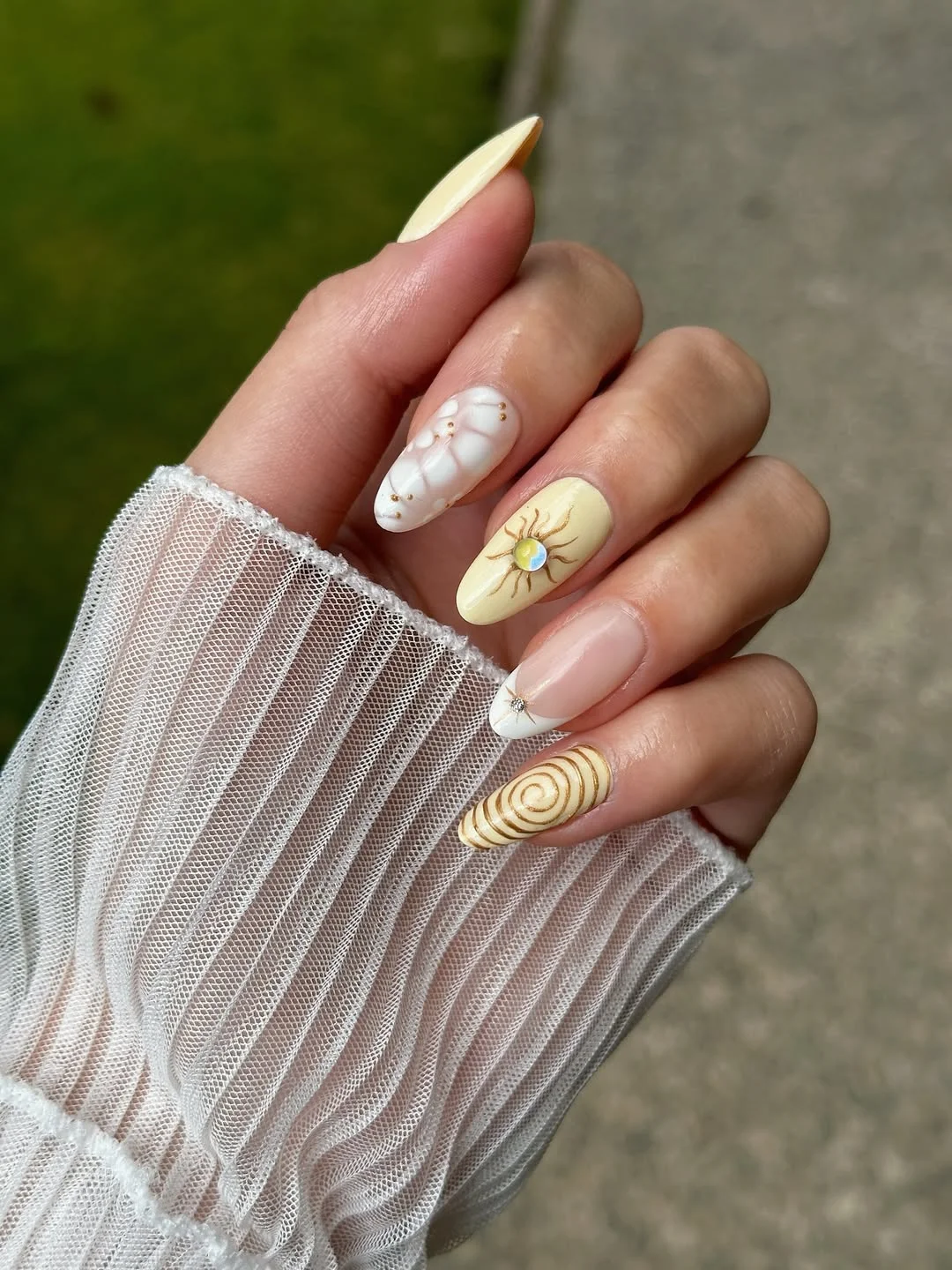 summer yellow nails 2026 Golden Yellow Celestial Nails With Soft White Accents