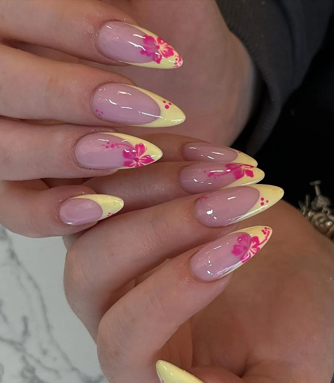 summer yellow nails 2026 Glossy Yellow French Tips With Hot Pink Hibiscus