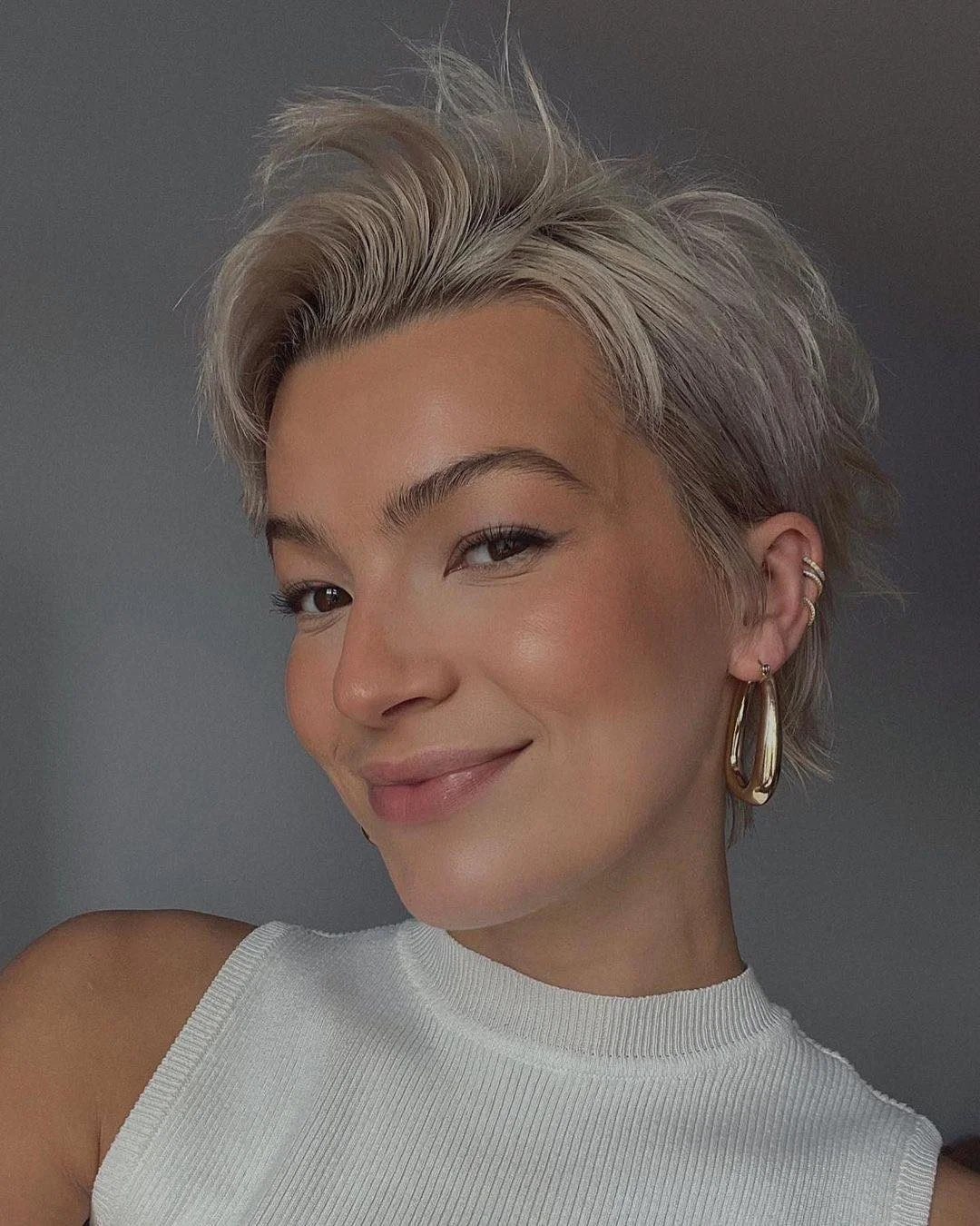 textured summer short hairstyles 2026 Platinum Cropped Pixie With Lifted Texture