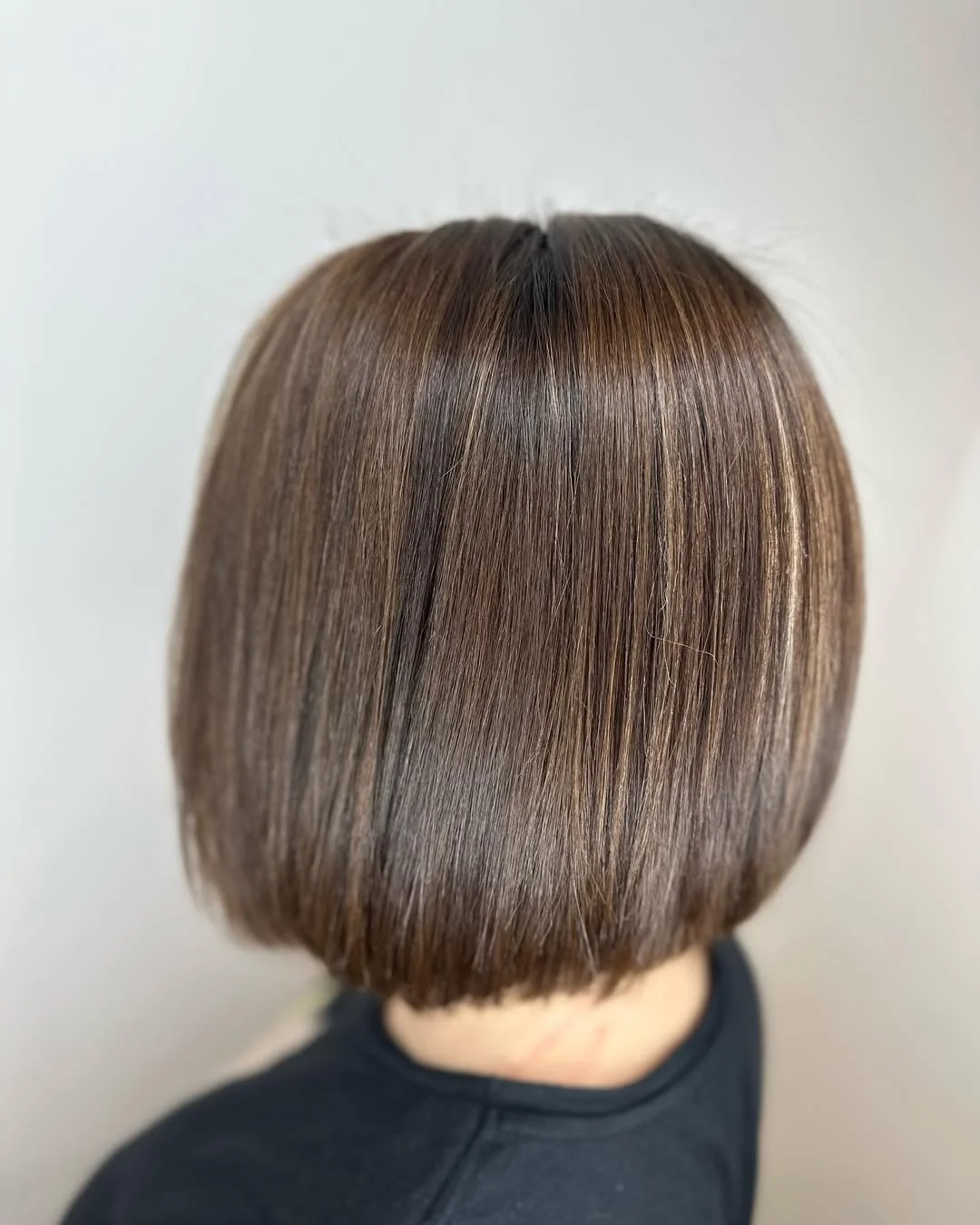 textured summer short hairstyles 2026 Smooth Rounded Bob With A Clean Blunt Line