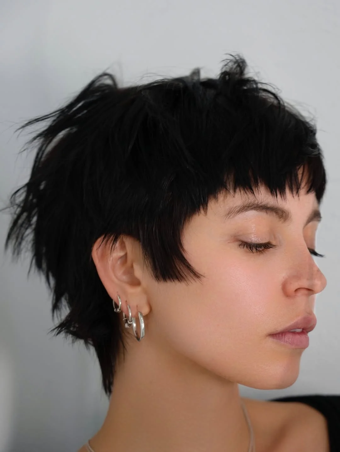 textured summer short hairstyles 2026 Shaggy Micro Pixie With Feathered Pieces