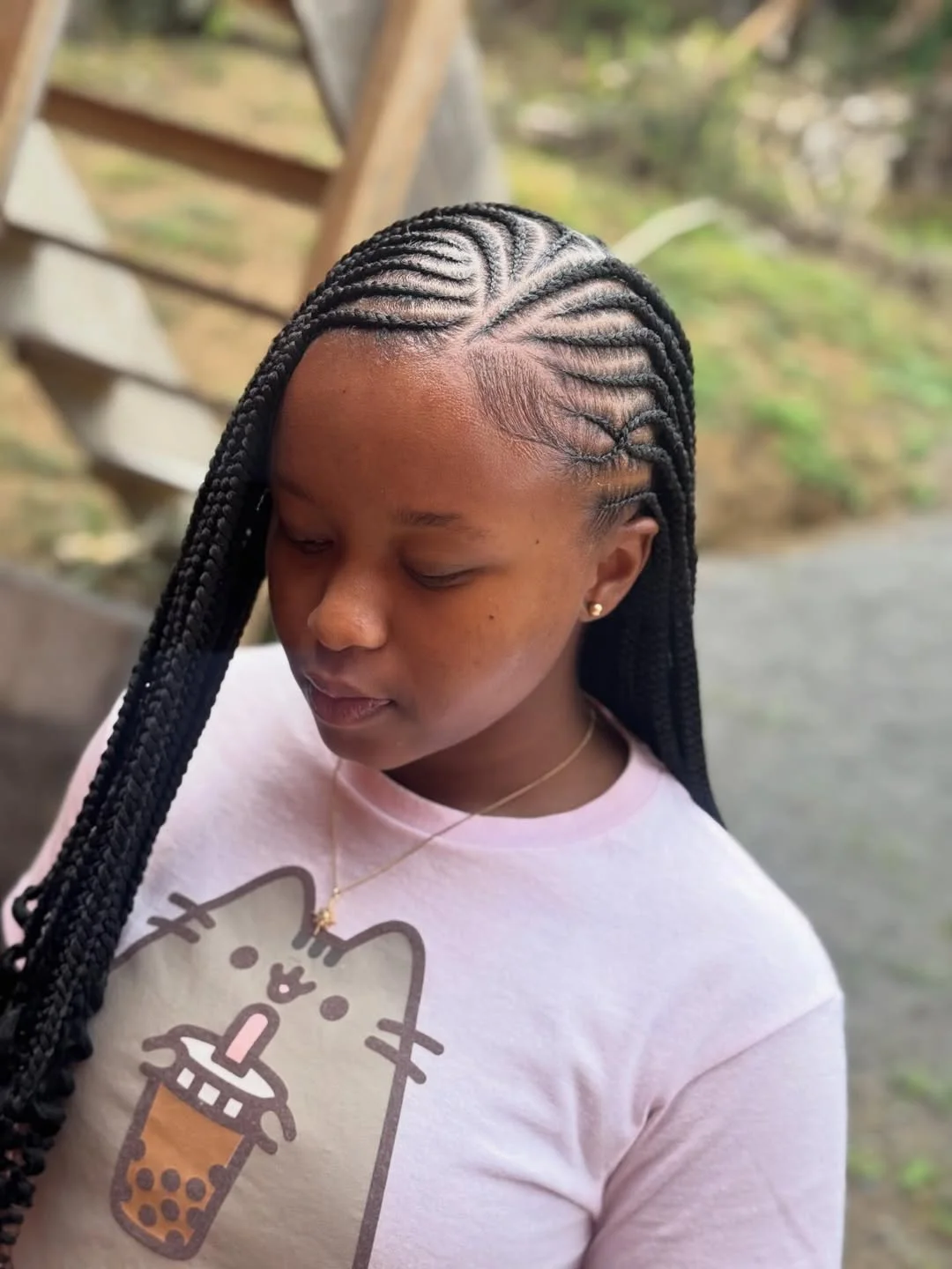 trendy summer braids hairstyle 2026 Side-Swept Cornrow Box Braids With Sleek Detail