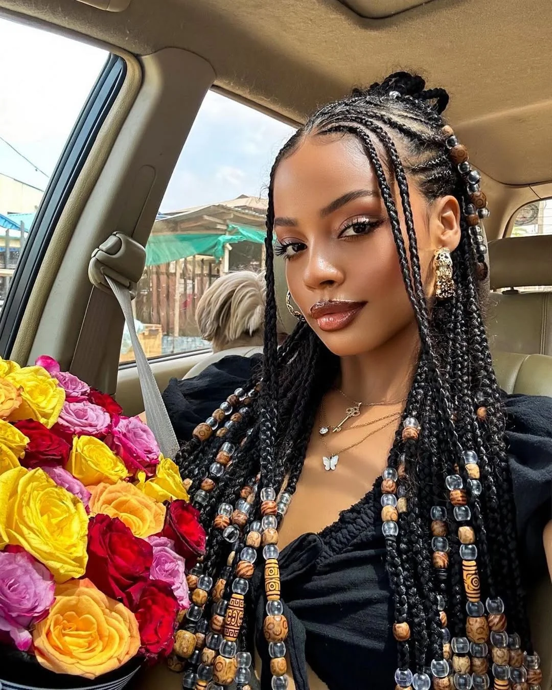 trendy summer braids hairstyle 2026 Long Beaded Braids With Vacation Energy