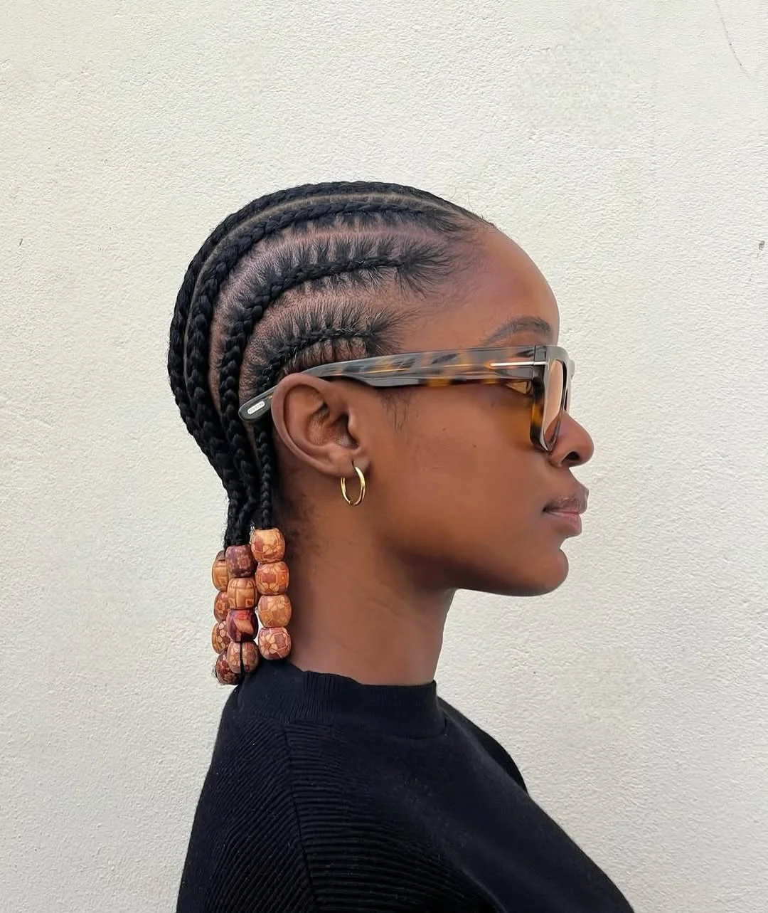 trendy summer braids hairstyle 2026 Sleek Cornrow Braids With Statement Beads