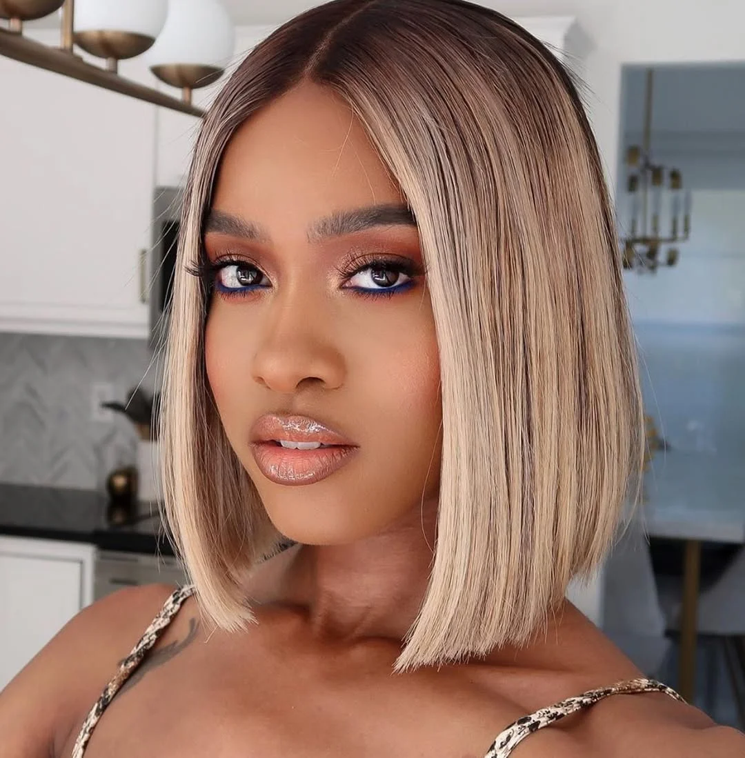 trendy summer hairstyle black women 2026 Blunt Creamy Bob With A Sleek Middle Part