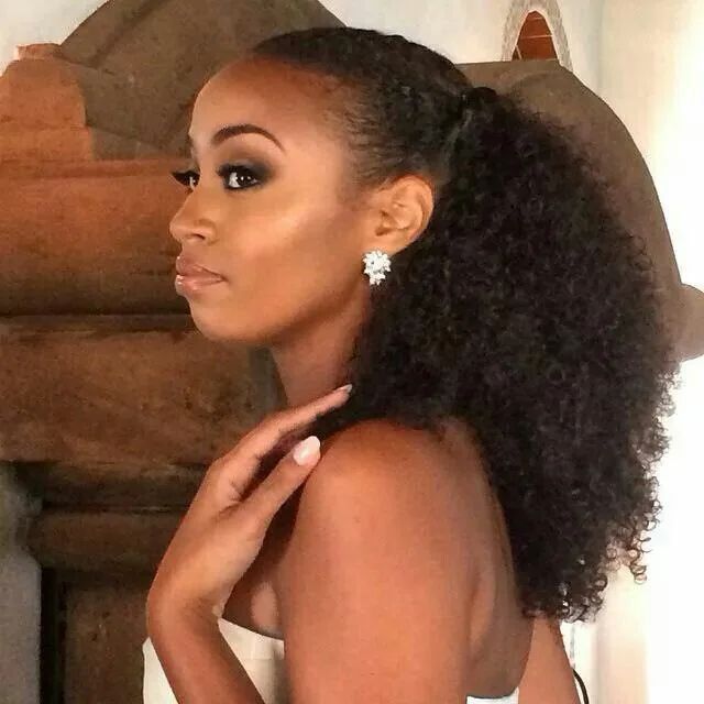 trendy summer hairstyle black women 2026 Curly Ponytail With A Sleek Lifted Crown
