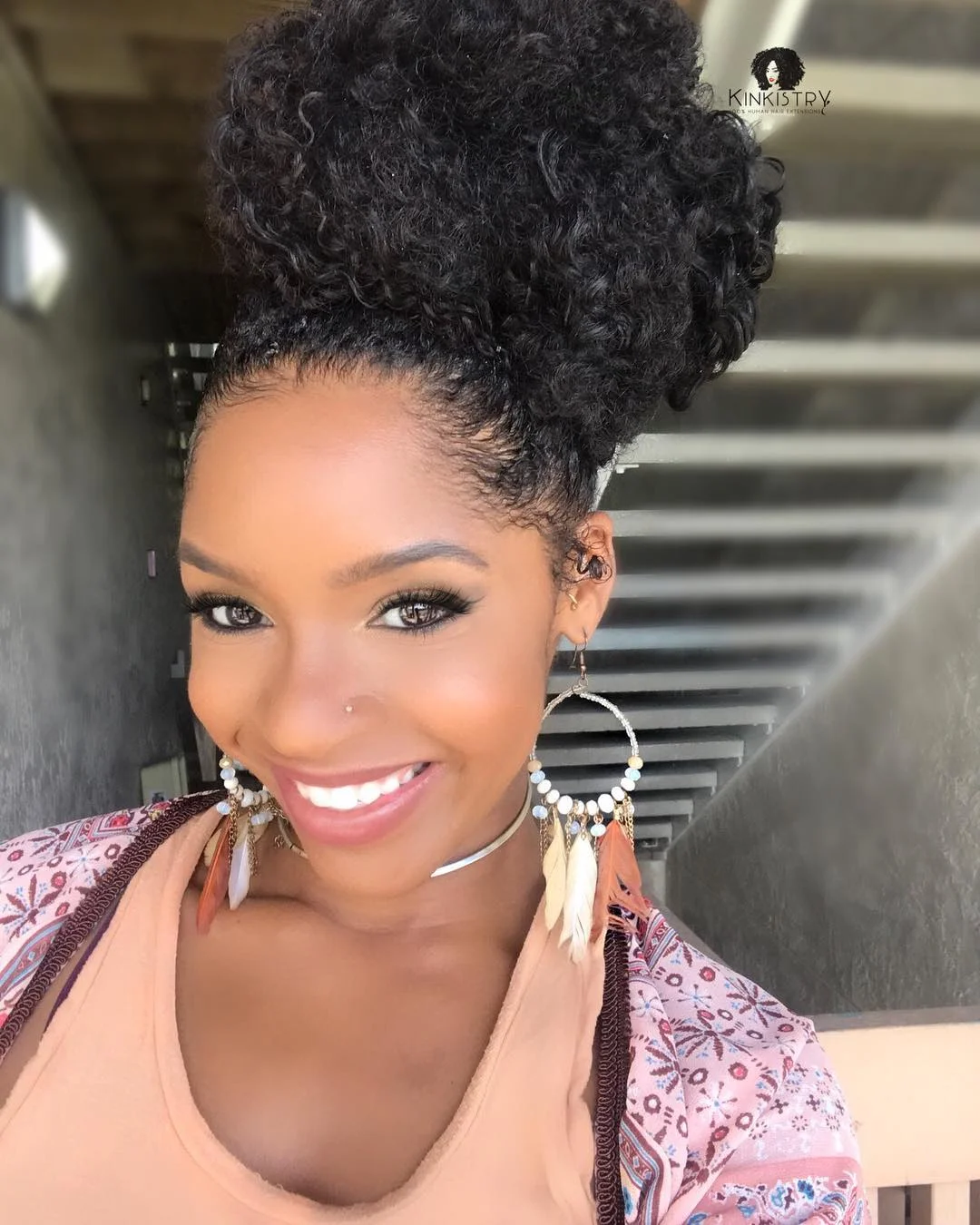 trendy summer hairstyle black women 2026 High Curly Puff With A Soft Statement Finish