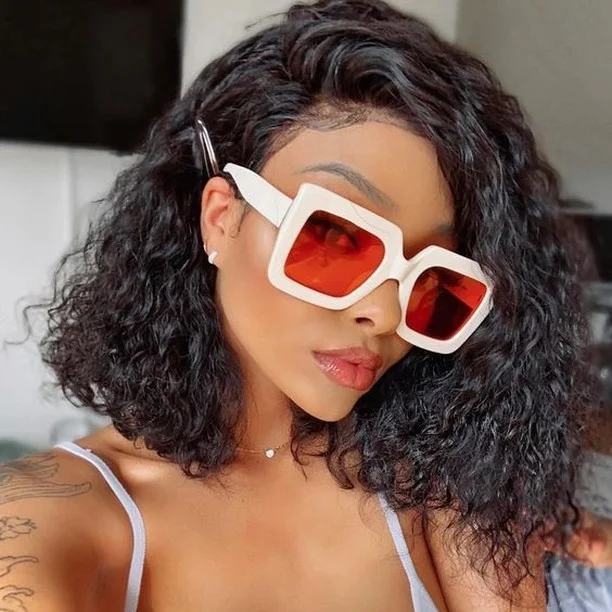 trendy summer hairstyle black women 2026 Shoulder-Grazing Curly Lob With Fashion-Forward Ease