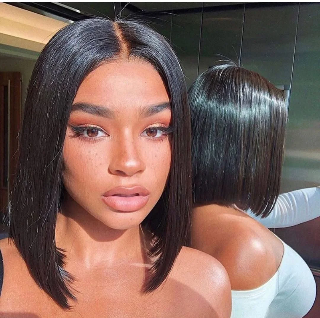 trendy summer hairstyle black women 2026 Sleek Black Blunt Bob With A Mirror-Shine Finish