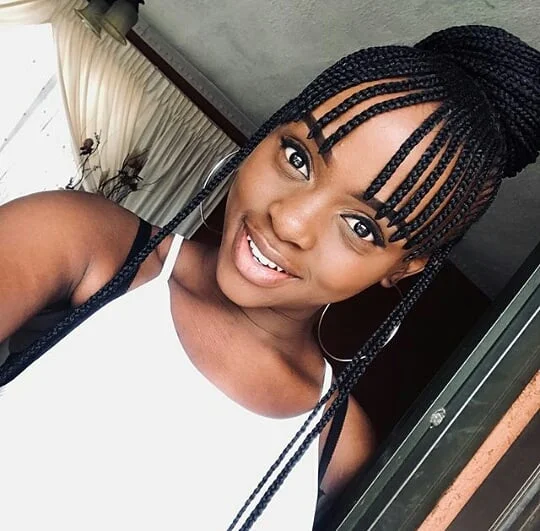 trendy summer hairstyle black women 2026 Braided High Bun With Face-Framing Pieces