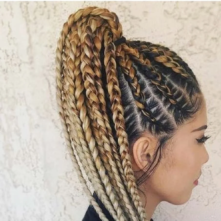 trendy summer hairstyle black women 2026 Blonde Feed-In Braided Ponytail With Sculpted Parts