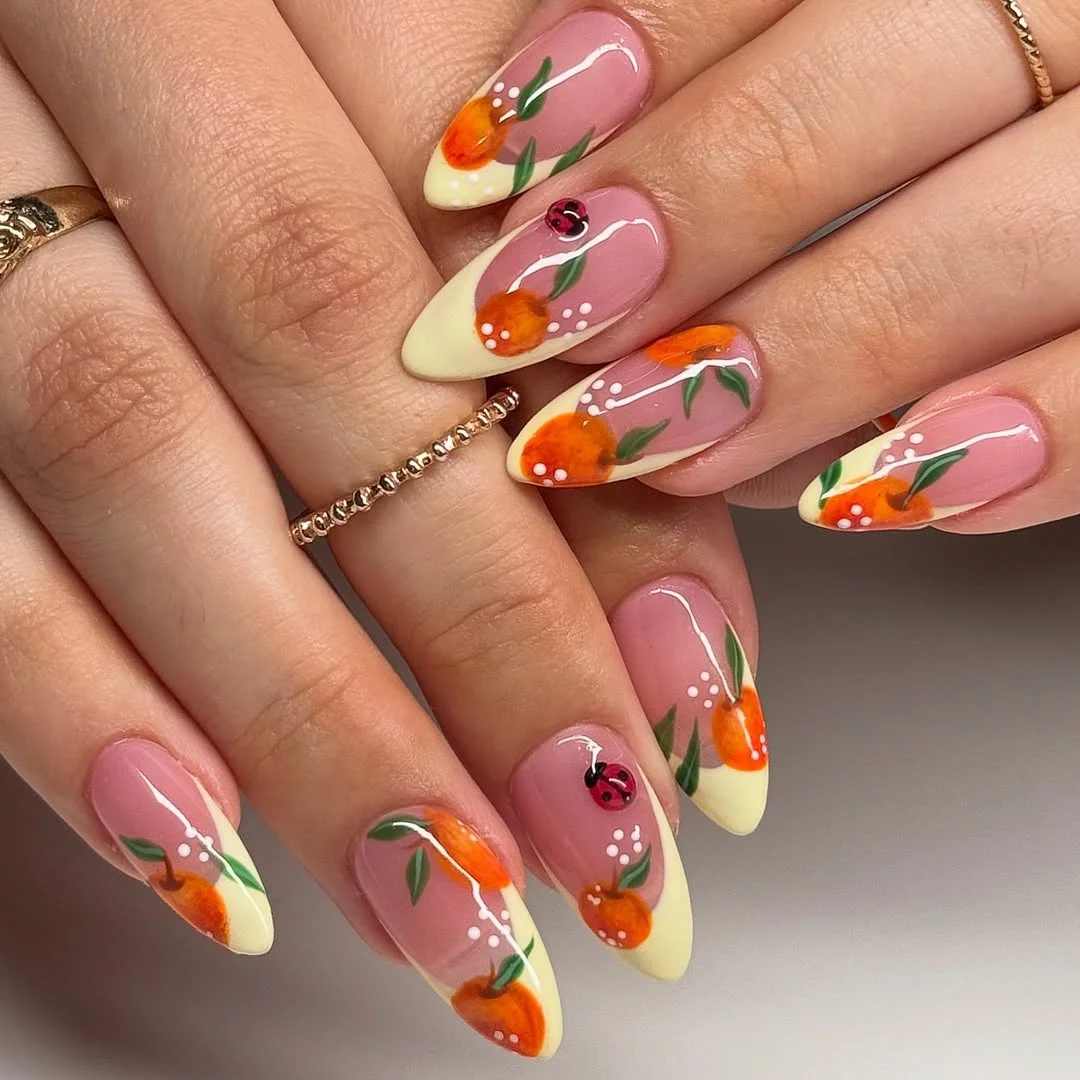 trendy summer nails 2026 Creamy Citrus Almond Nails With Orange Blossom Art