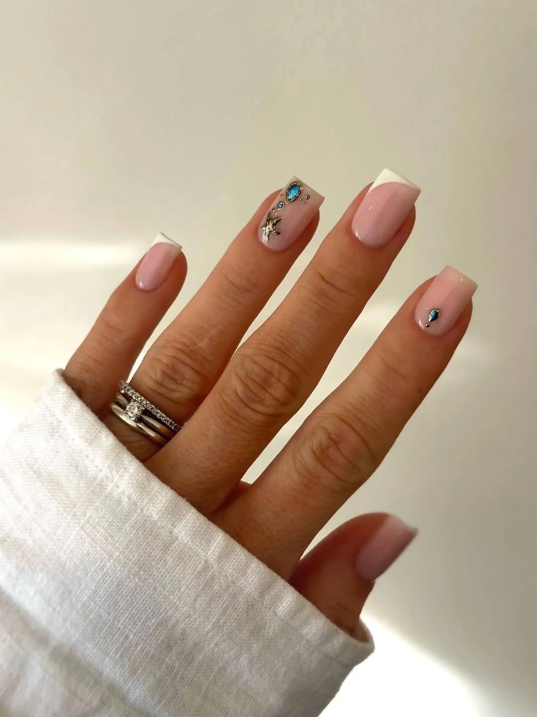 trendy summer nails 2026 Minimal Square French Nails With Turquoise Gem Accents