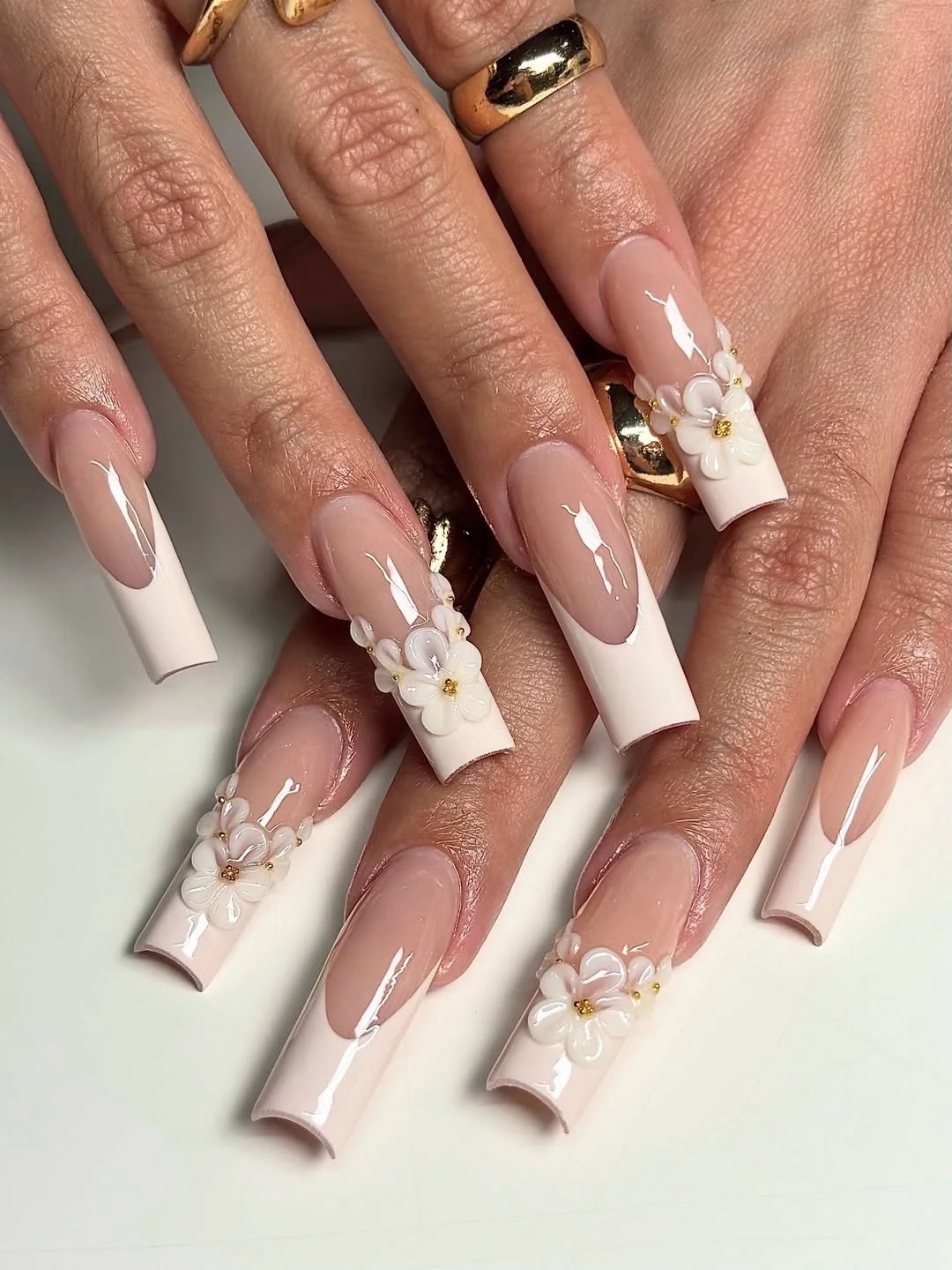 trendy summer nails 2026 Sculpted White French Nails With Soft 3D Flowers