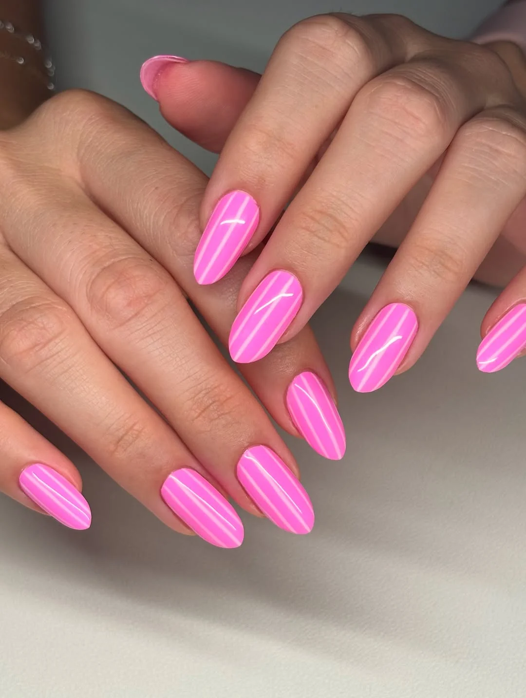 trendy summer nails 2026 Glossy Barbie Pink Almond Nails