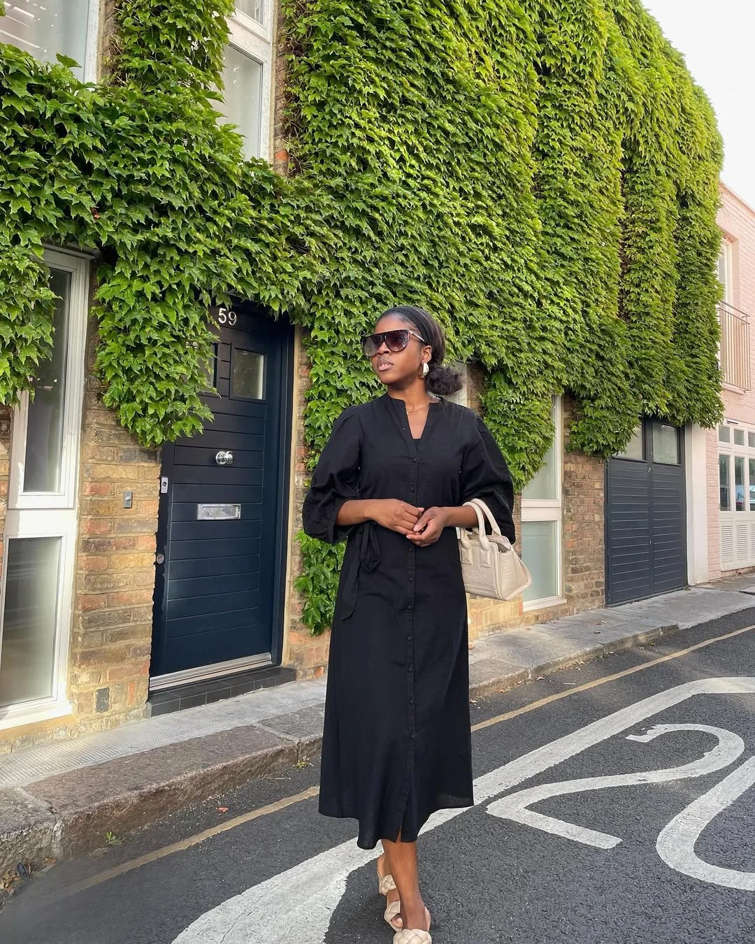 trendy summer outfits for black woman 2026 Minimal Black Shirt Dress With Quiet City Polish