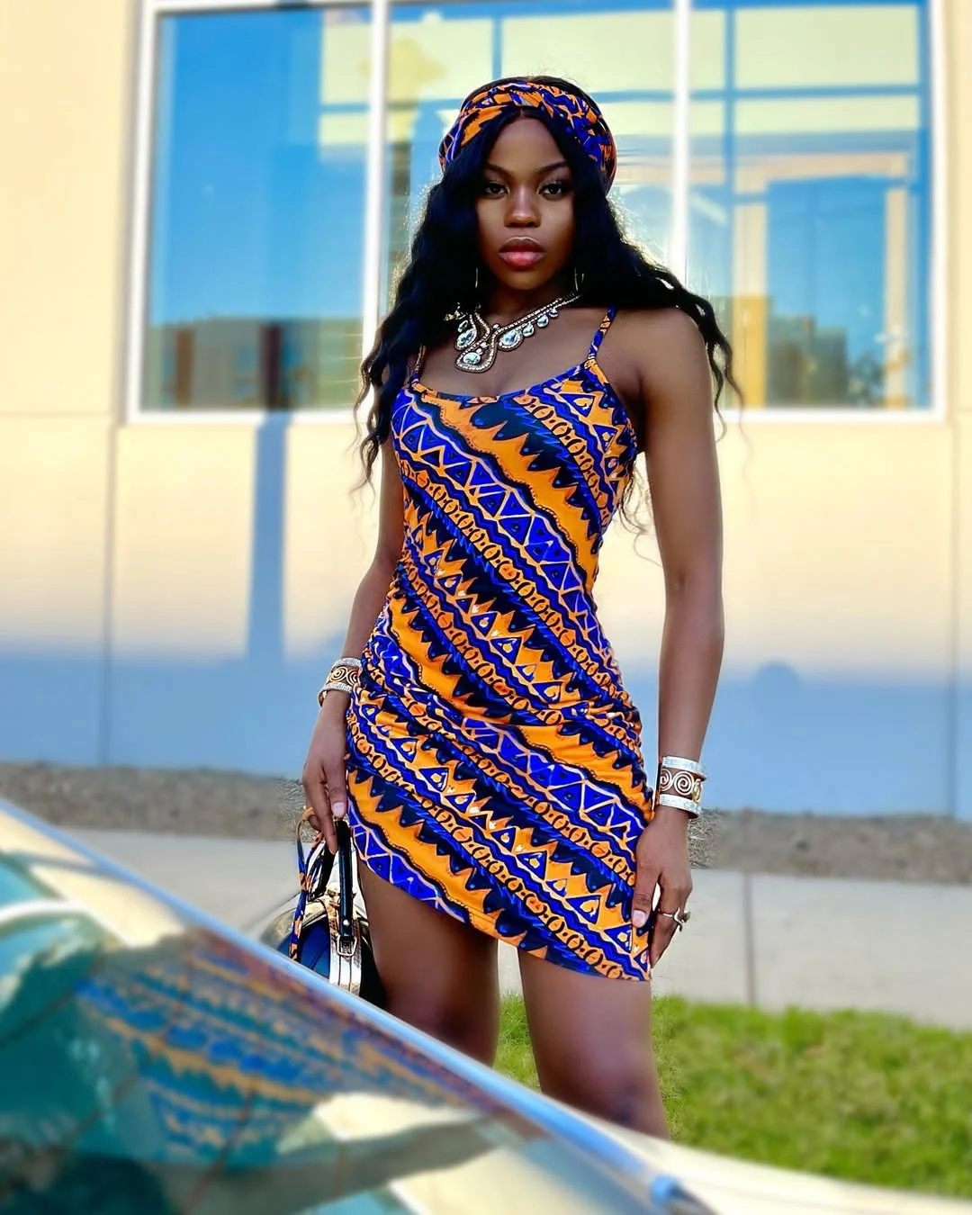 trendy summer outfits for black woman 2026 Bold Print Mini Dress With Headscarf Energy