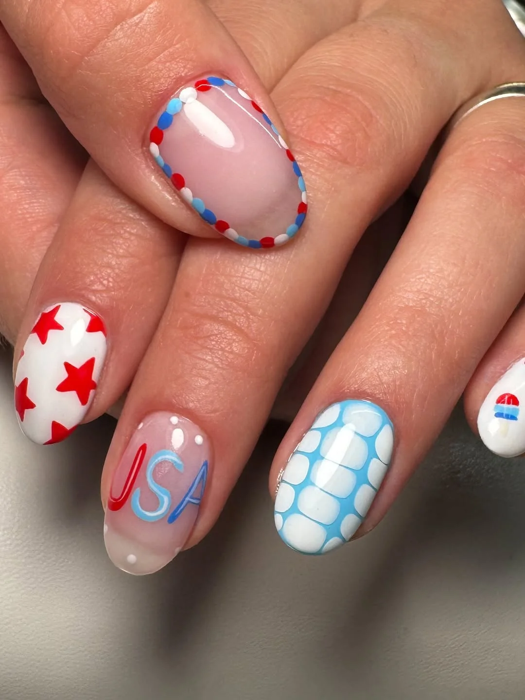 usa nails 2026 Playful Retro USA Nails With Stars, Lettering, And A Popsicle Accent