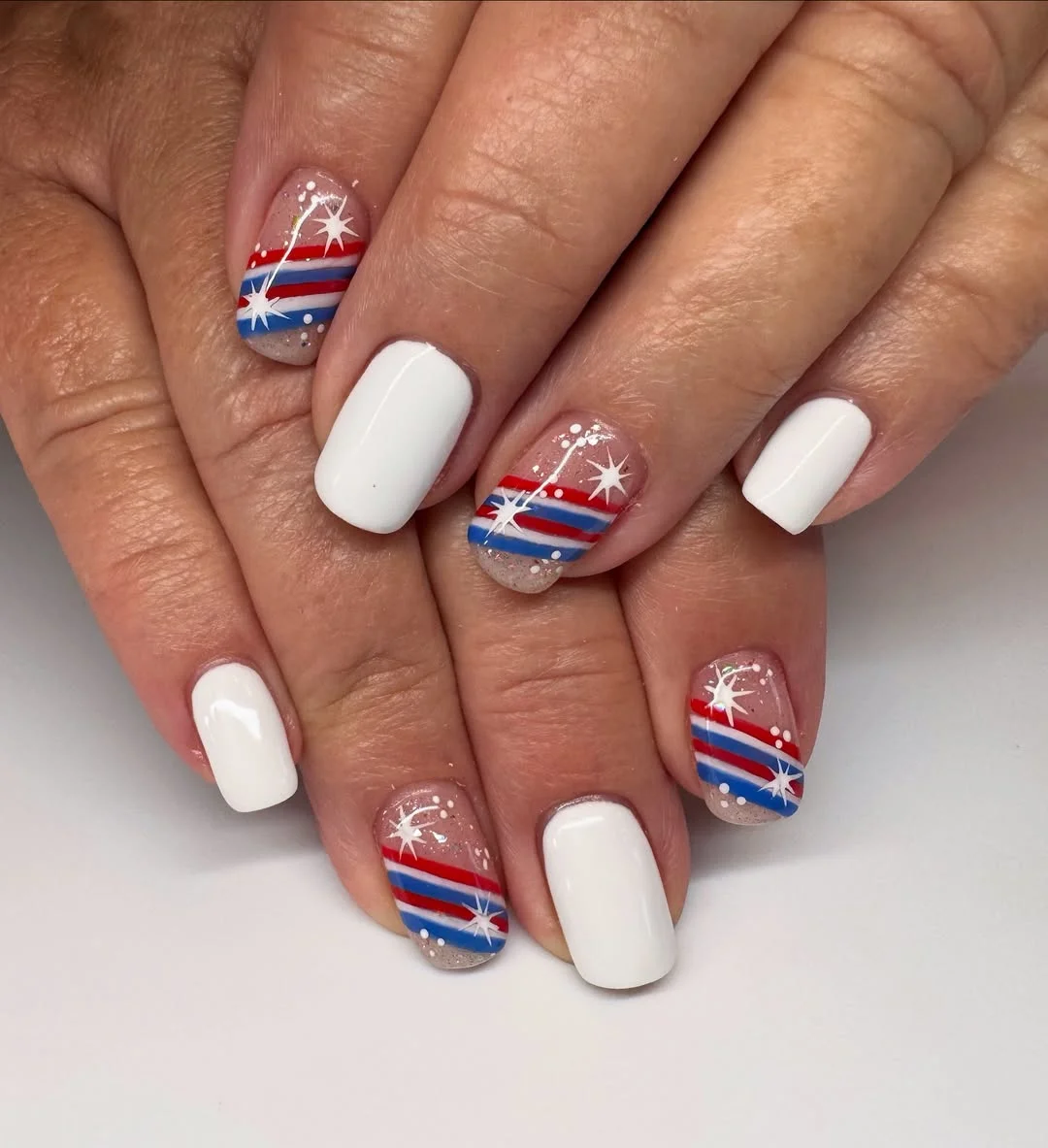 usa nails 2026 White Nails With Sparkling Red And Blue Firework Stripes