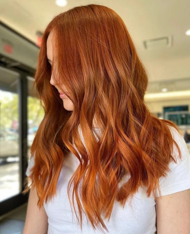 warm summer auburn hair color 2026 Bright Copper Auburn With Summer Glow