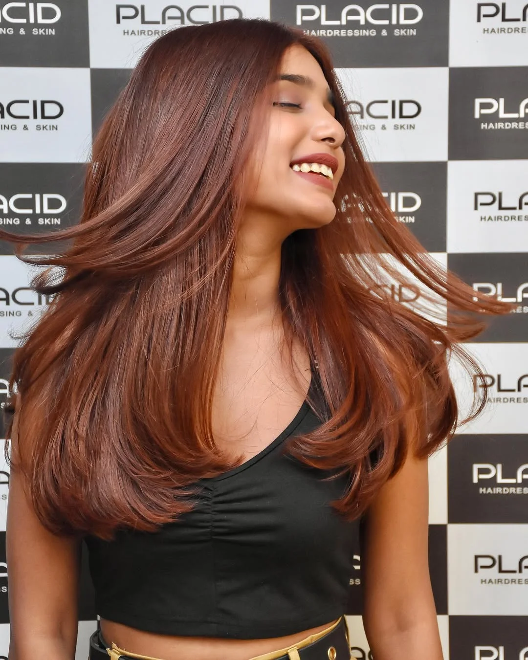 warm summer auburn hair color 2026 Soft Auburn Blowout With Cinnamon Ends