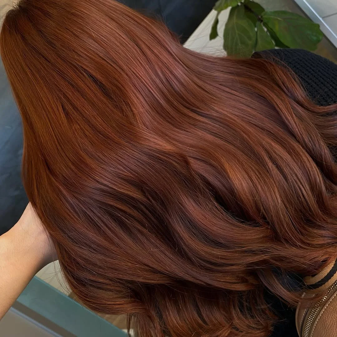 warm summer auburn hair color 2026 Glossy Mahogany Auburn With Soft Chocolate Depth