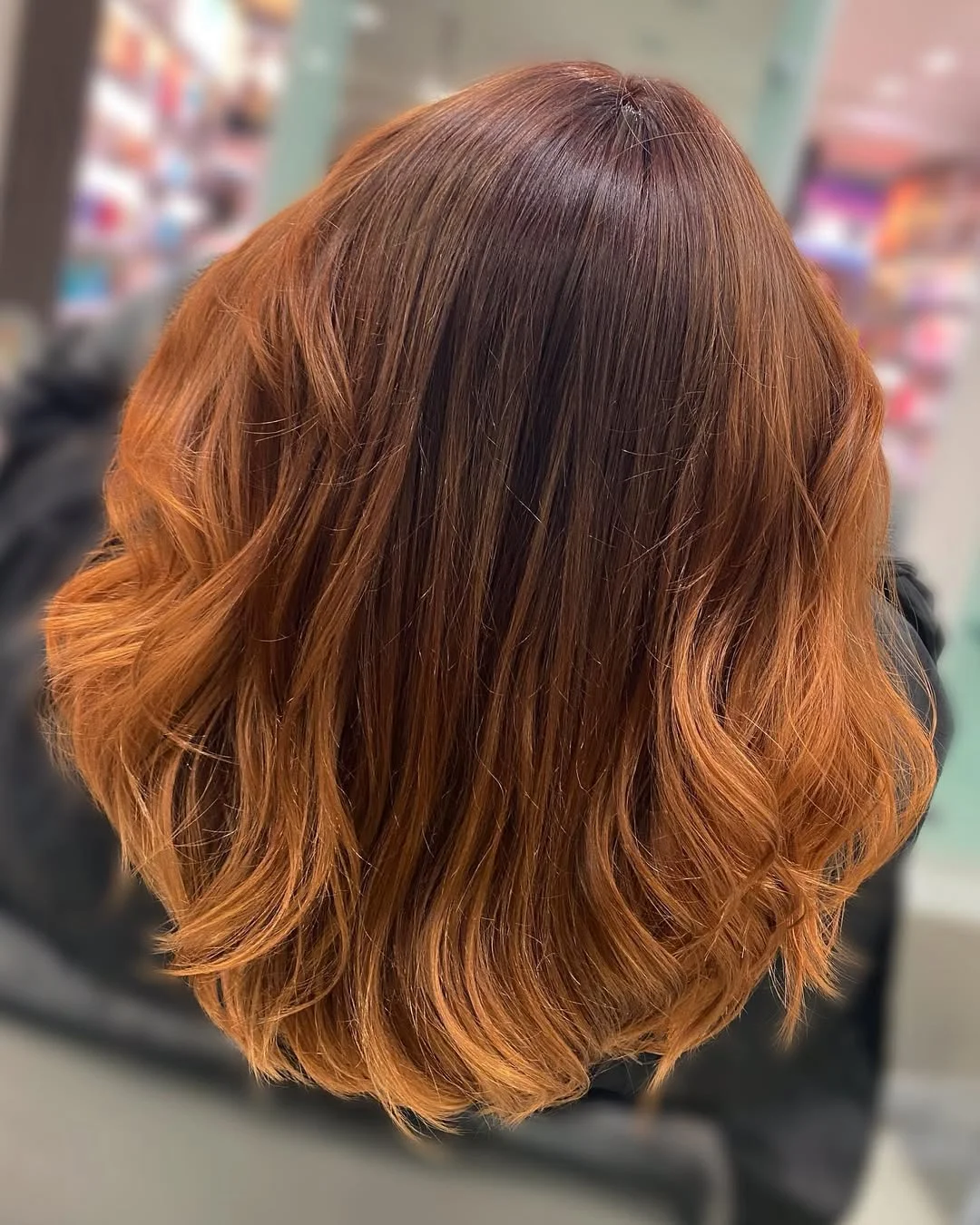warm summer auburn hair color 2026 Bright Auburn Ombre Bob With Copper Ends