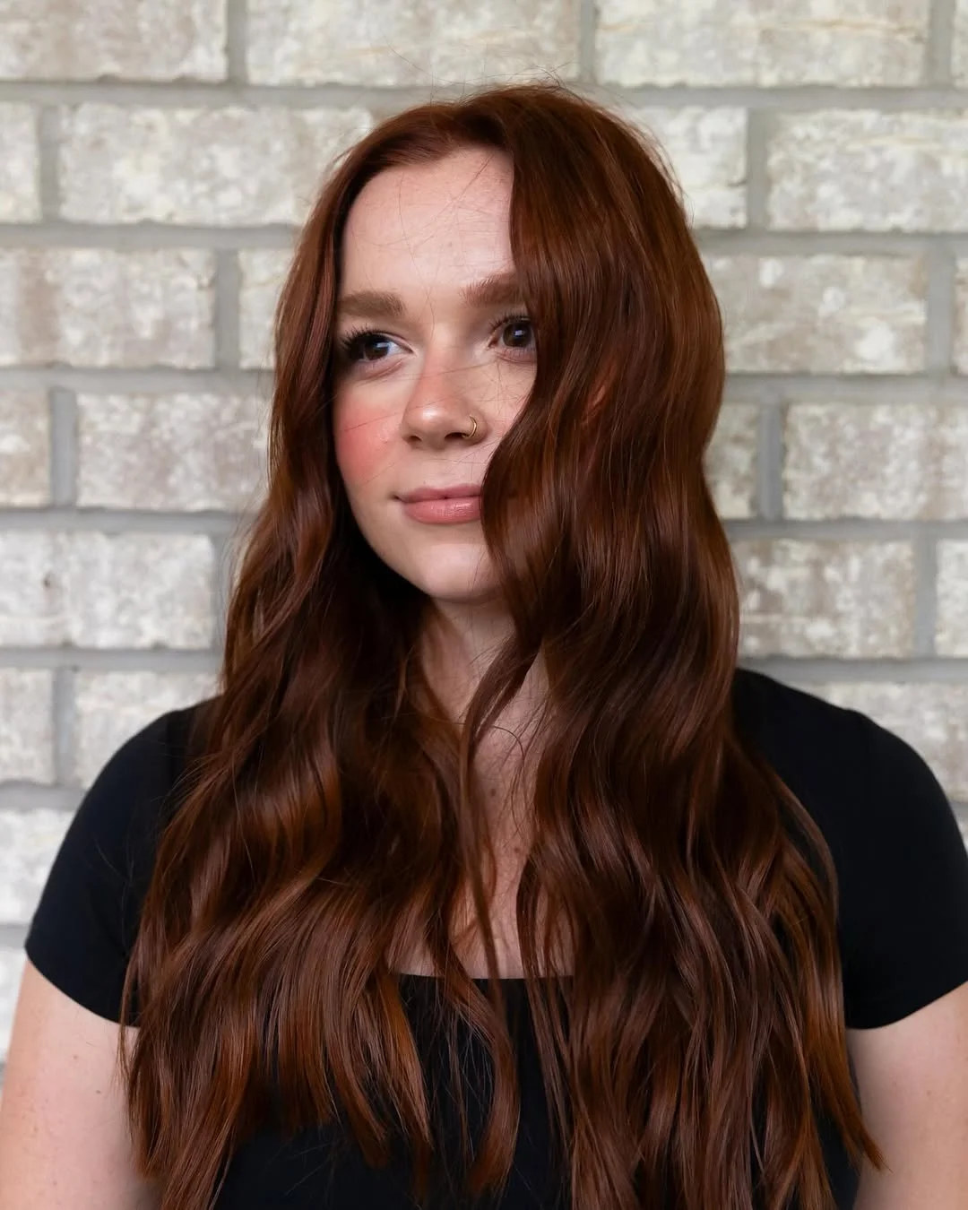 warm summer auburn hair color 2026 Soft Cinnamon Auburn With Loose Waves