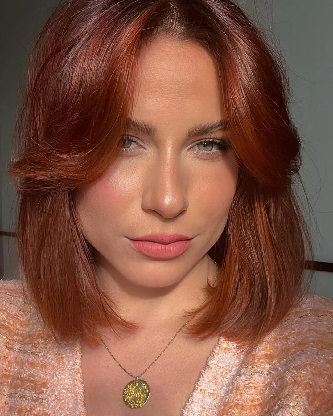 warm summer auburn hair color 2026 Polished Copper Auburn Bob