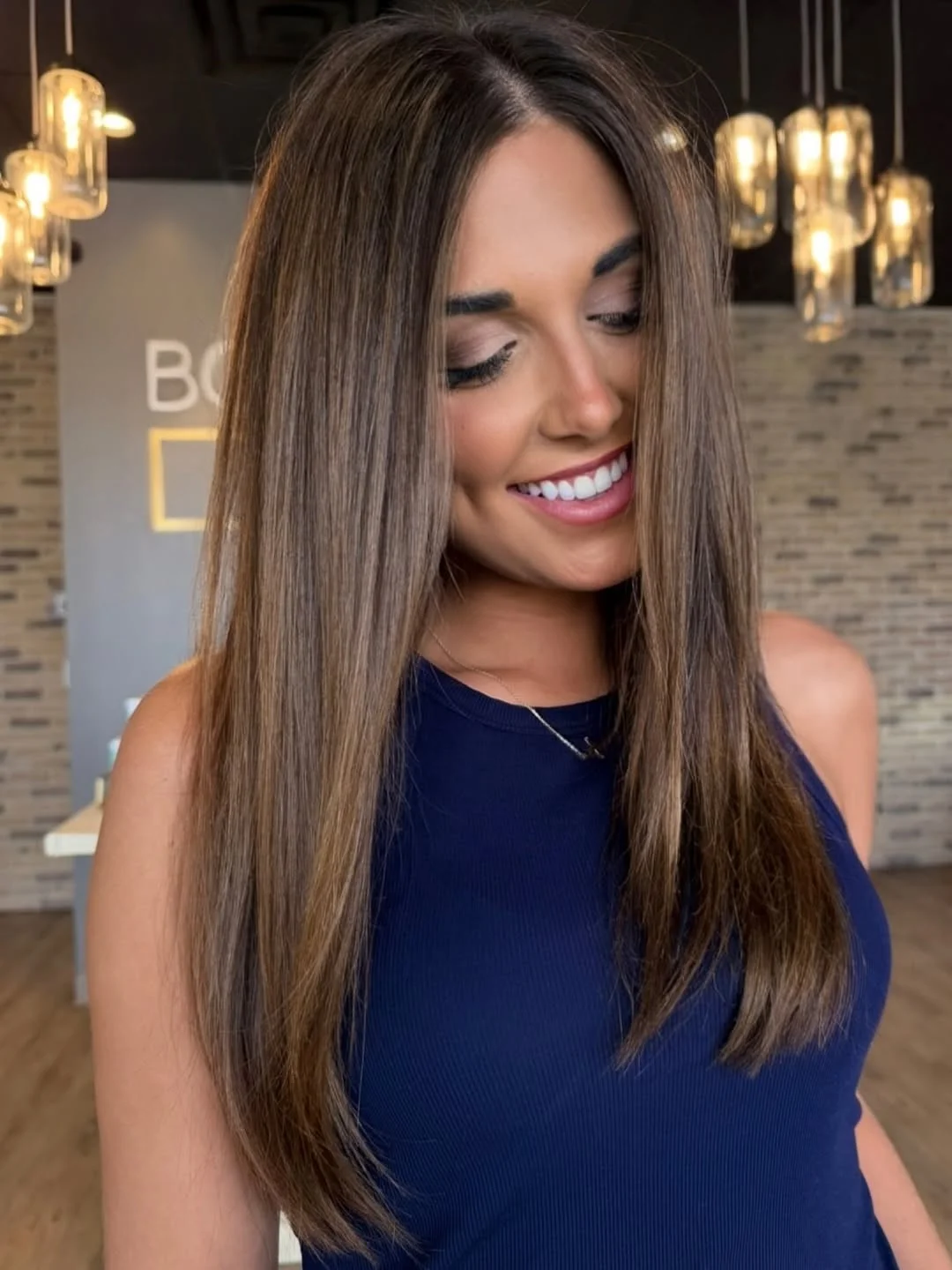 warm summer brunette hair color 2026 Smoky Straight Brunette With Sleek Summer Polish