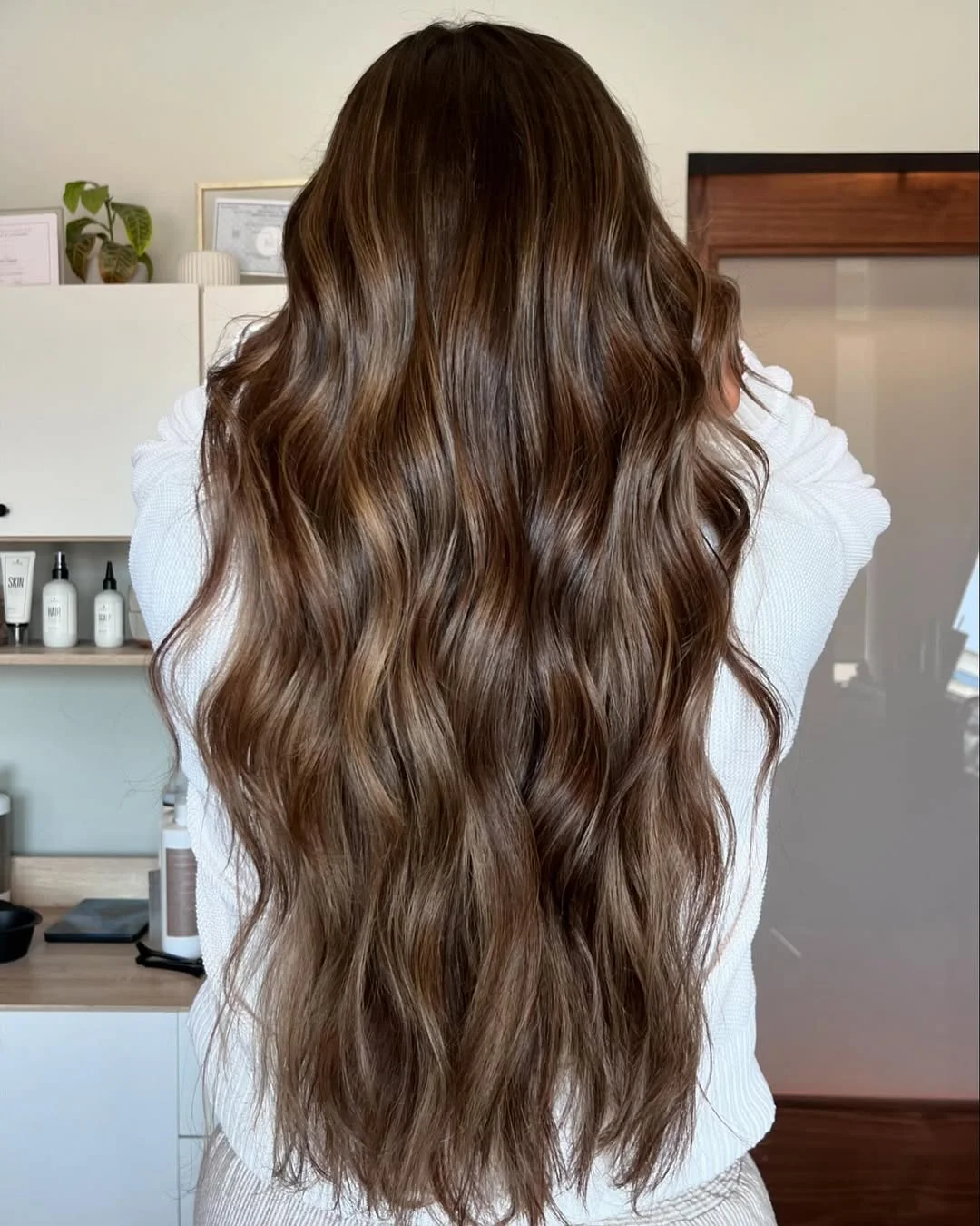 warm summer brunette hair color 2026 Long Brunette Waves With Beachy Espresso Shine