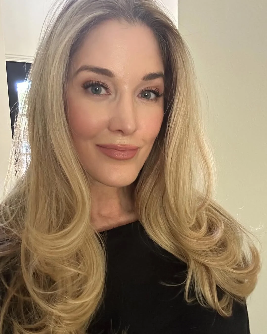 youthful summer haircuts for women over 40 2026 Soft Blonde Layers With Lifted Face-Framing Shape