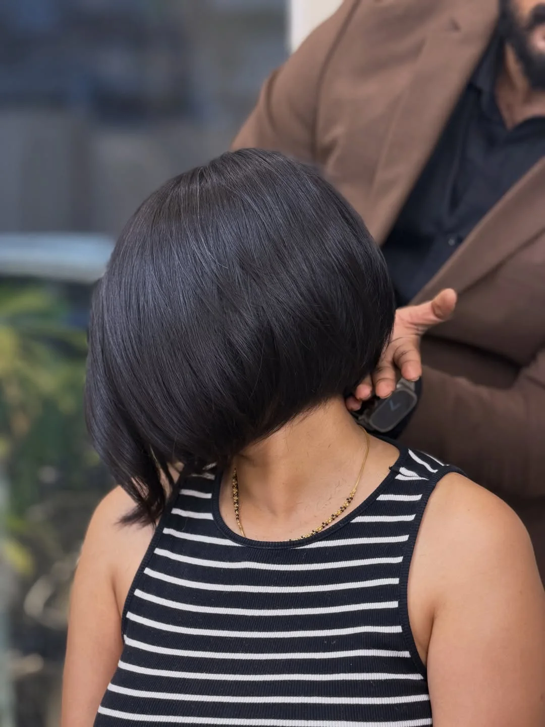 youthful summer haircuts for women over 40 2026 Rounded Bob With Sleek Dark Shine