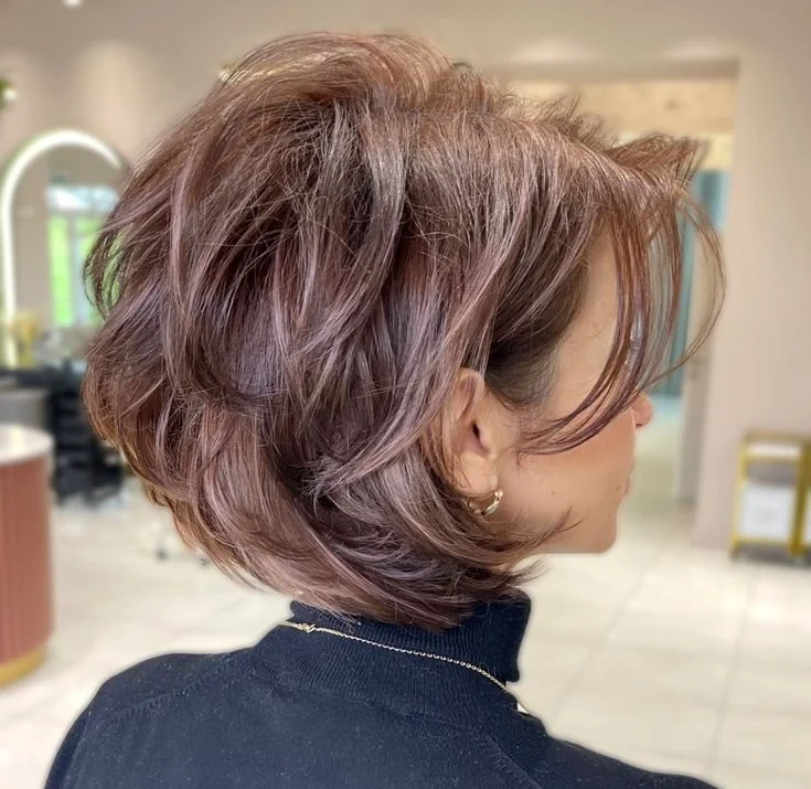 youthful summer haircuts for women over 40 2026 Soft Mauve Bob With Airy Layered Shape