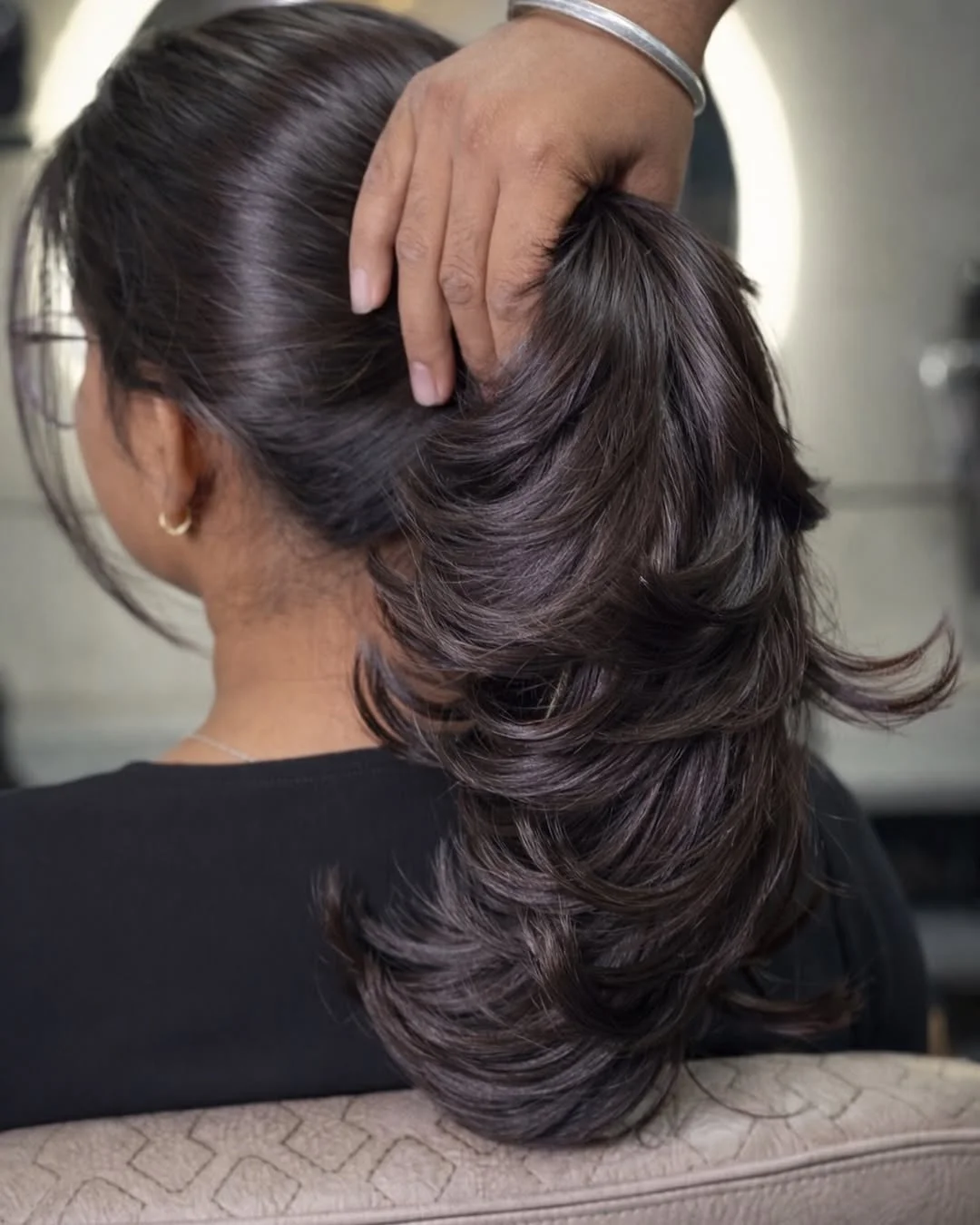 youthful summer haircuts for women over 40 2026 Polished Layered Ponytail With Face-Lifting Shape
