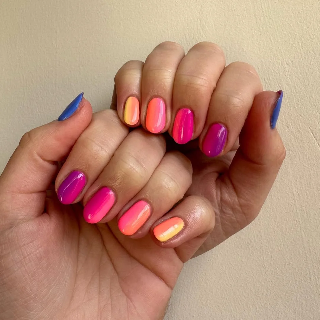 bright summer nails 2026 Glossy Pink, Coral And Blue Gradient Nails