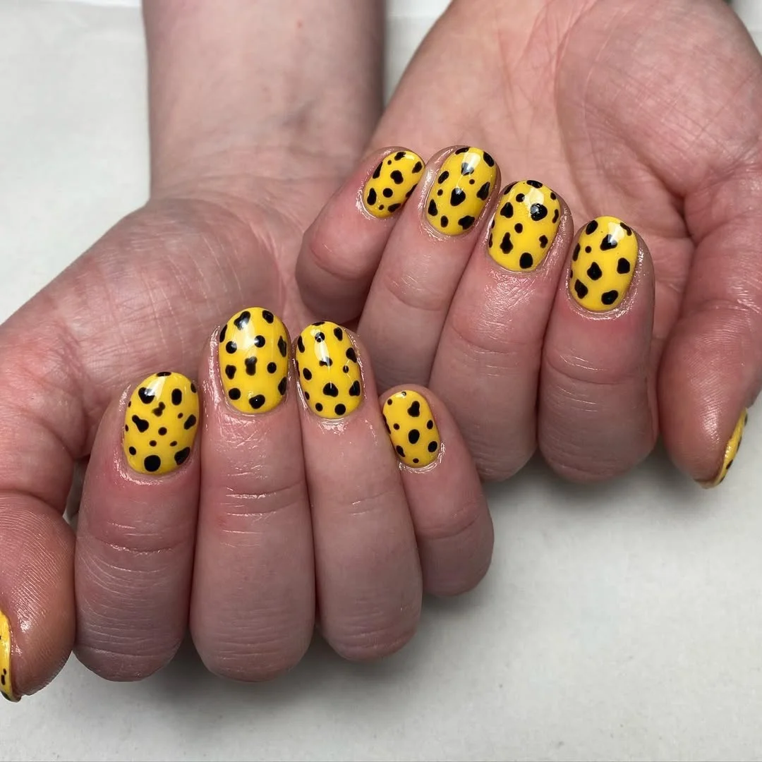 bright summer nails 2026 Sunny Yellow Polka Dot Nails With Retro Pop Energy