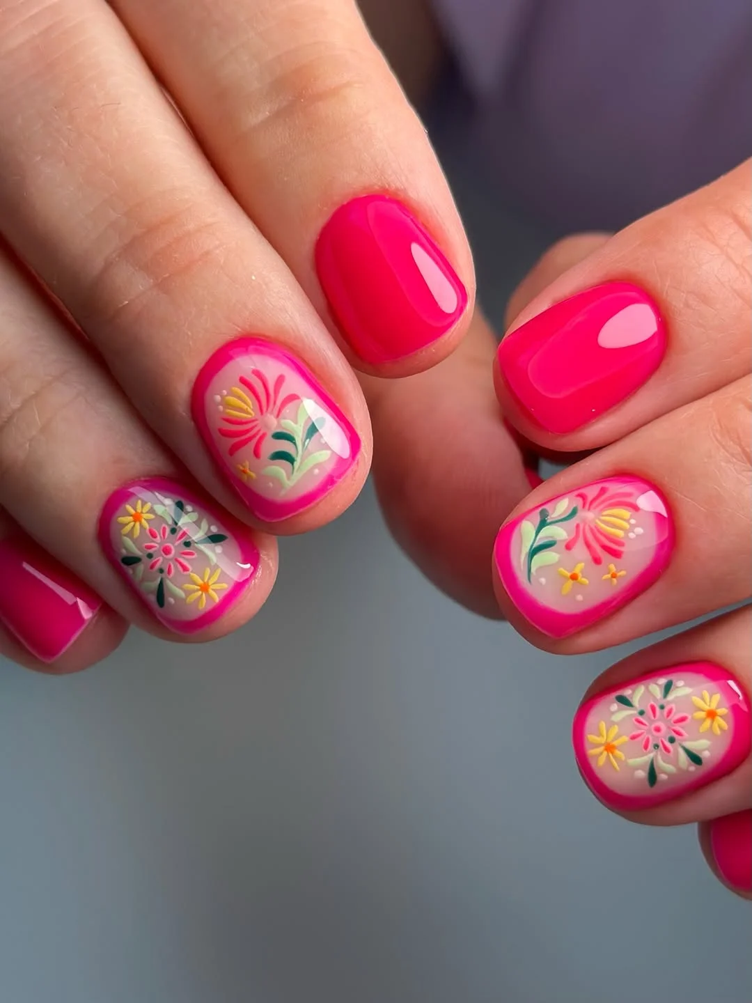 bright summer nails 2026 Glossy Bright Pink Short Nails With Floral Frames