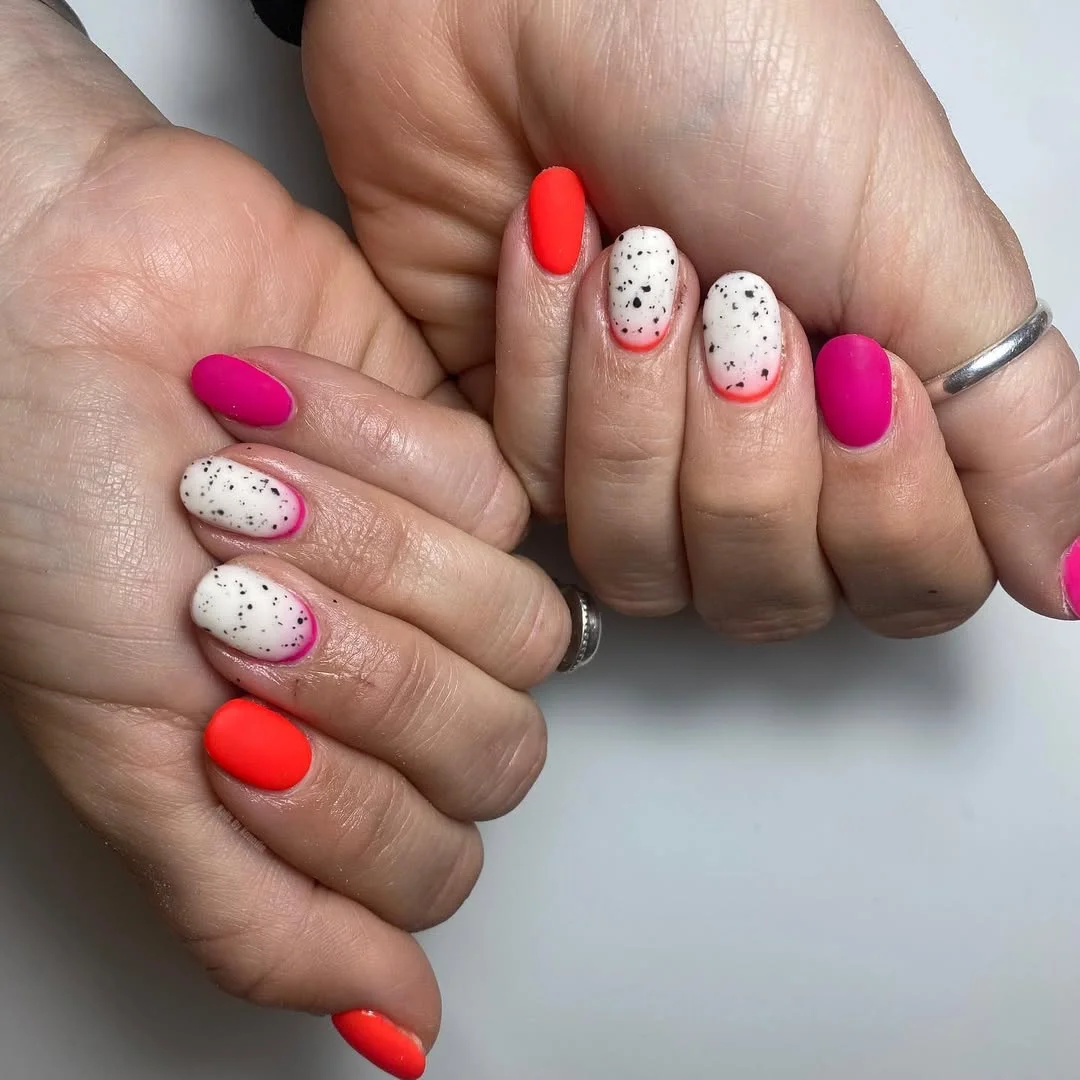 bright summer nails 2026 Neon Orange And Pink Speckled Summer Contrast