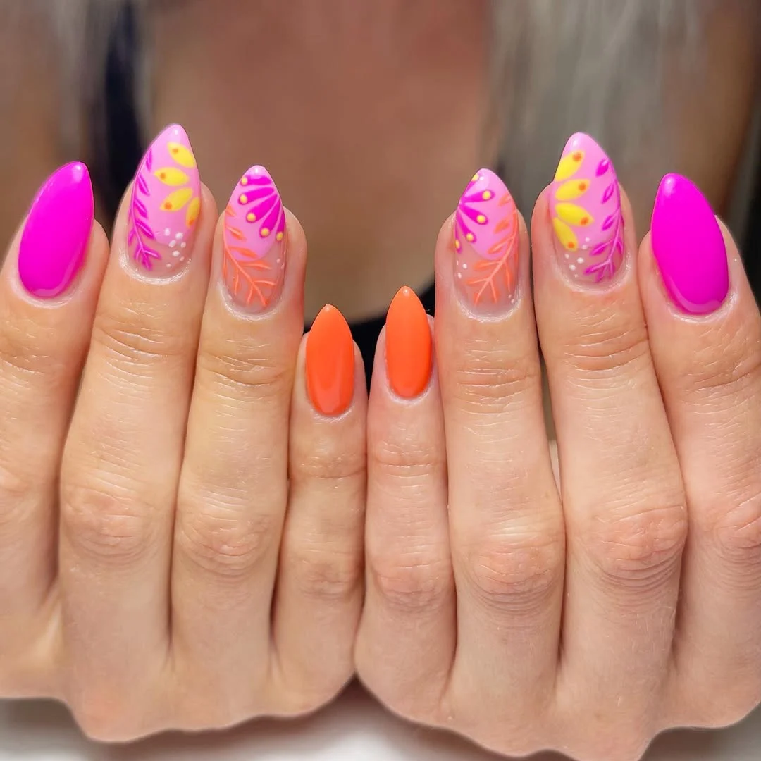 bright summer nails 2026 Neon Pink And Orange Almond Nails With Tropical Leaf Art