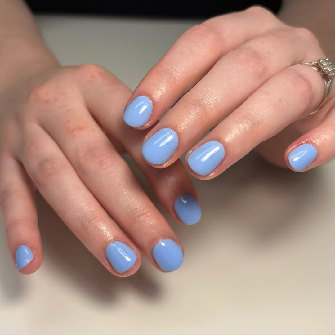 bright summer nails 2026 Glossy Sky Blue Short Nails For Clean Summer Color