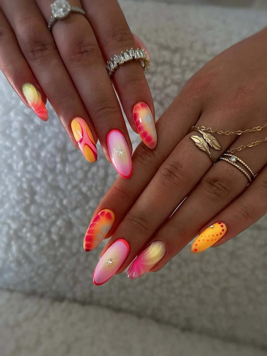 funky summer nails 2026 Sunset Almond Nails With Airbrushed Heat And Soft Star Accents