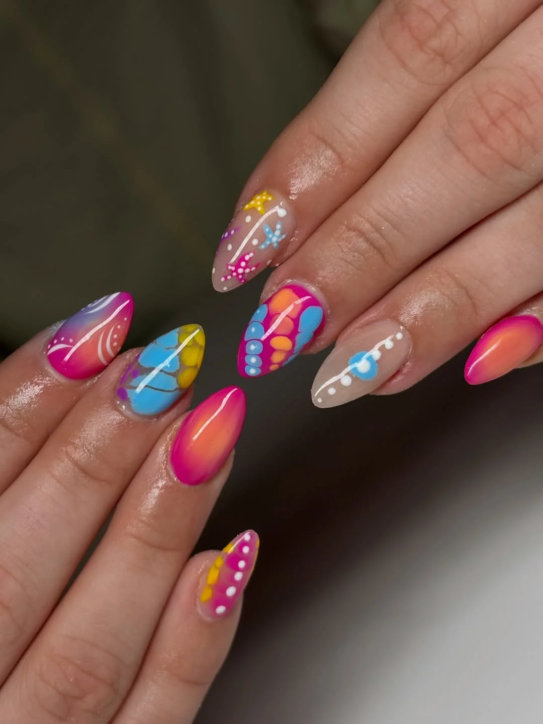 funky summer nails 2026 Bright Butterfly Almond Nails With Sunset Ombre And White Dot Art