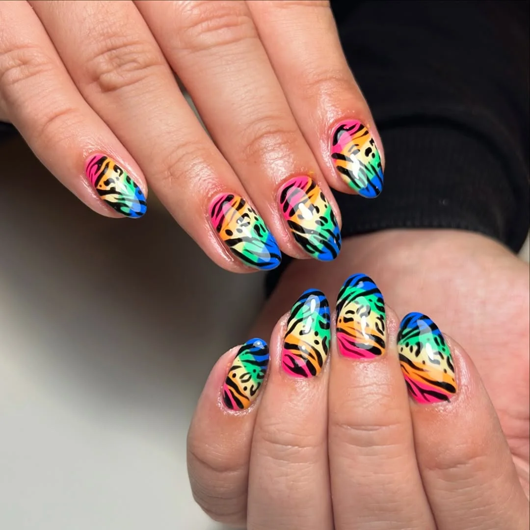 funky summer nails 2026 Rainbow Animal Print Almond Nails With Black Graphic Stripes