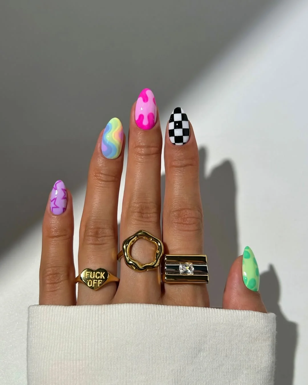 funky summer nails 2026 Pastel Funky Nails With Checkerboard And Pink Blob Art