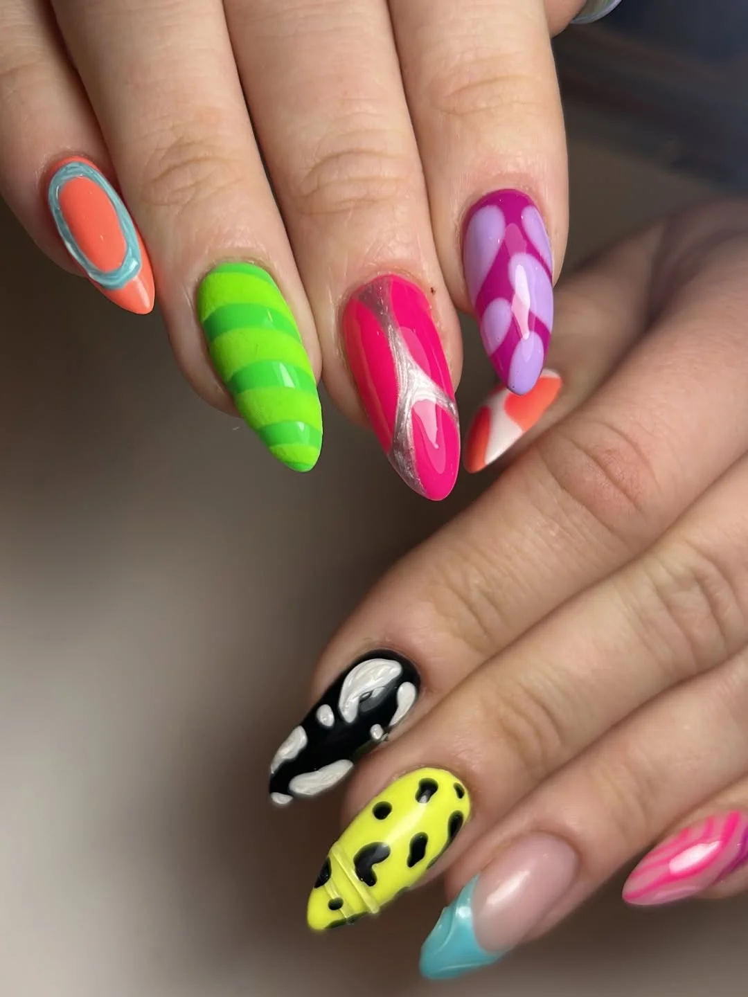 funky summer nails 2026 Long Almond Nails With Neon Swirls And 3D Texture