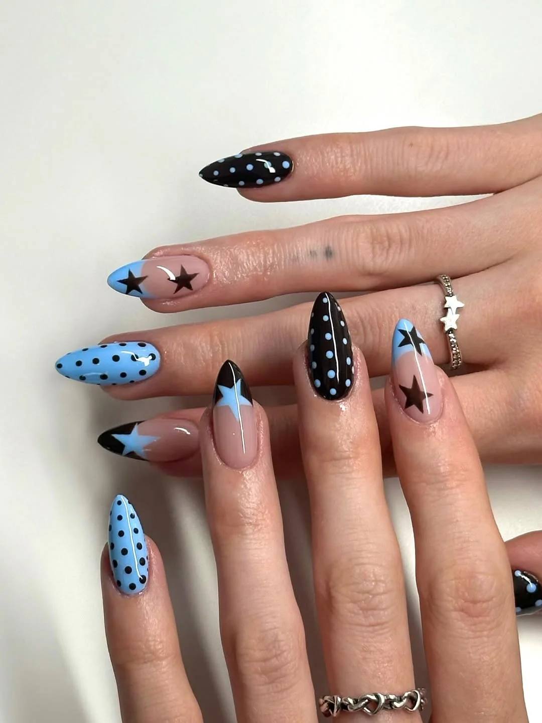 july nails design ideas 2026 Red Floral French Tips That Feel Bright and Feminine
